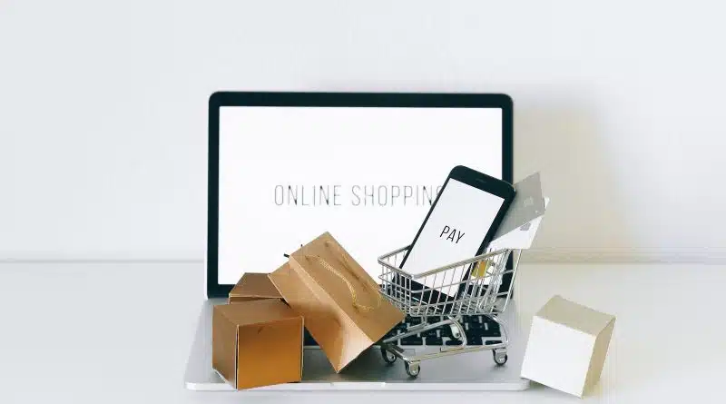 A Miniature Shopping Cart on MacBook Laptop